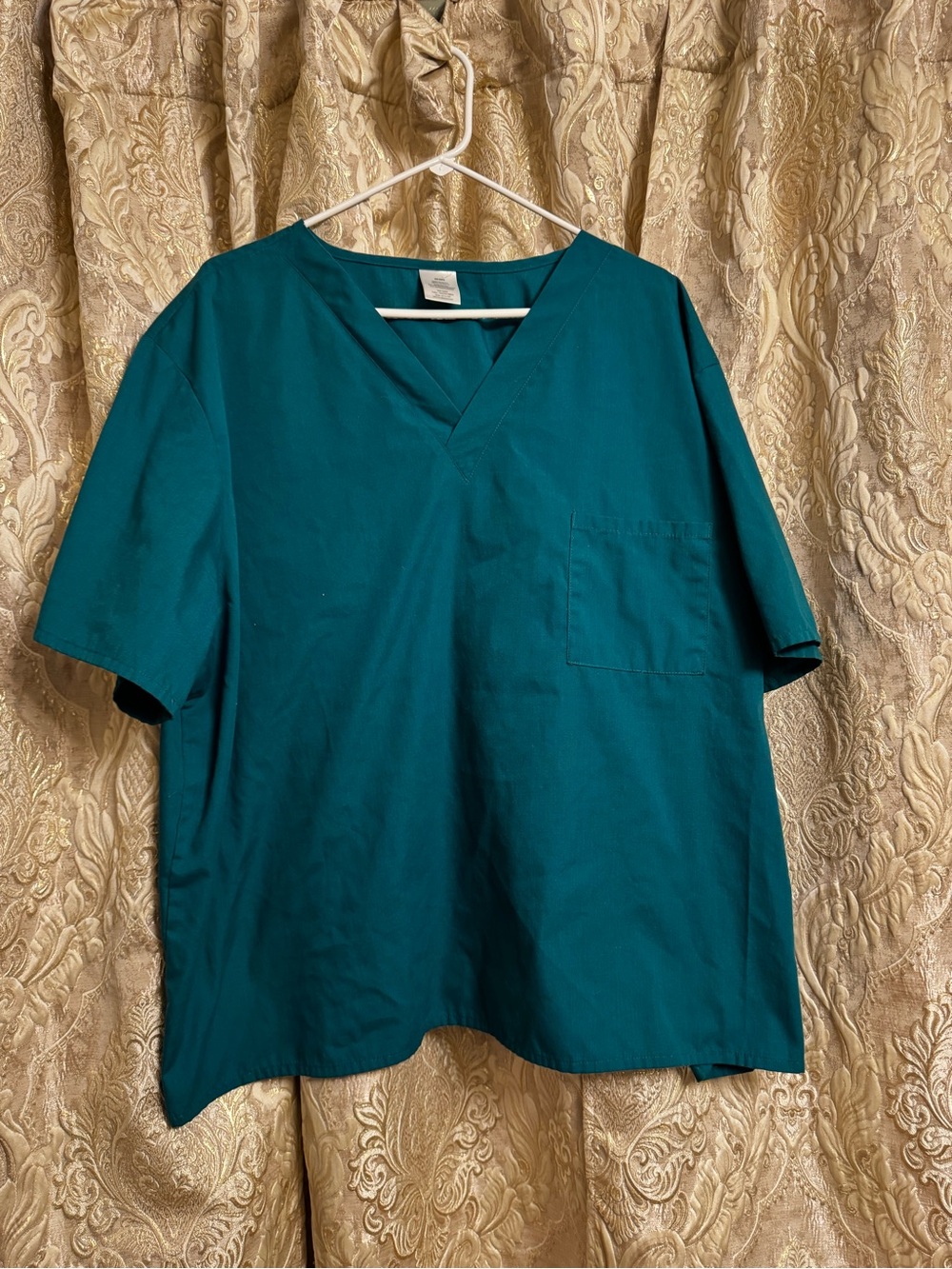 Green scrub top